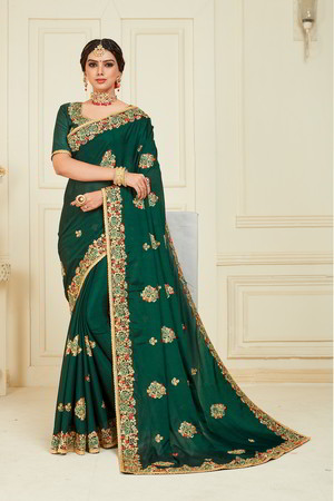 Зелёное шёлковое индийское сари, украшенное вышивкой с стразами