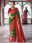 *Зелёное шёлковое вечернее индийское сари, украшенное вышивкой люрексом со стразами